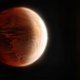 Artist's illustration of hot Jupiter as a red-orange world, with its host star on the right.